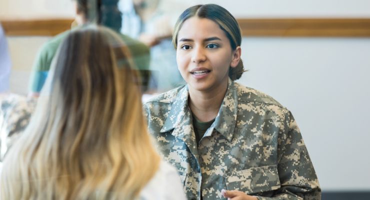 Image of a soldier talking to her daughter